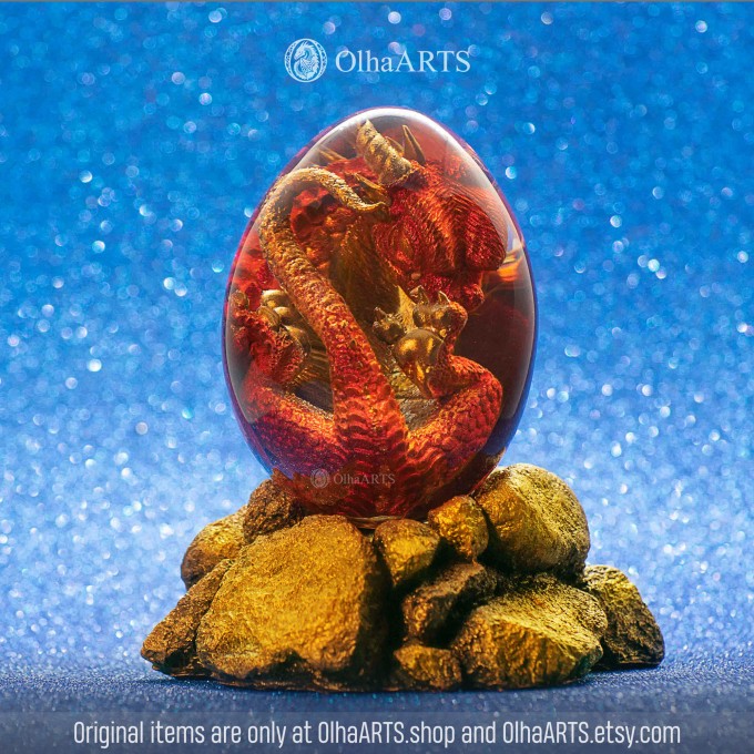 Red-gold Spiral-horned Dragon Egg. VIP Gift Set with a spiral-horned baby dragon in epoxy resin egg