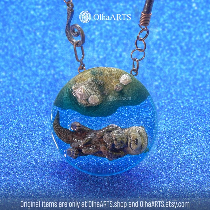 Pendant with Swimming Otters