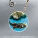Pendant with Swimming Otters