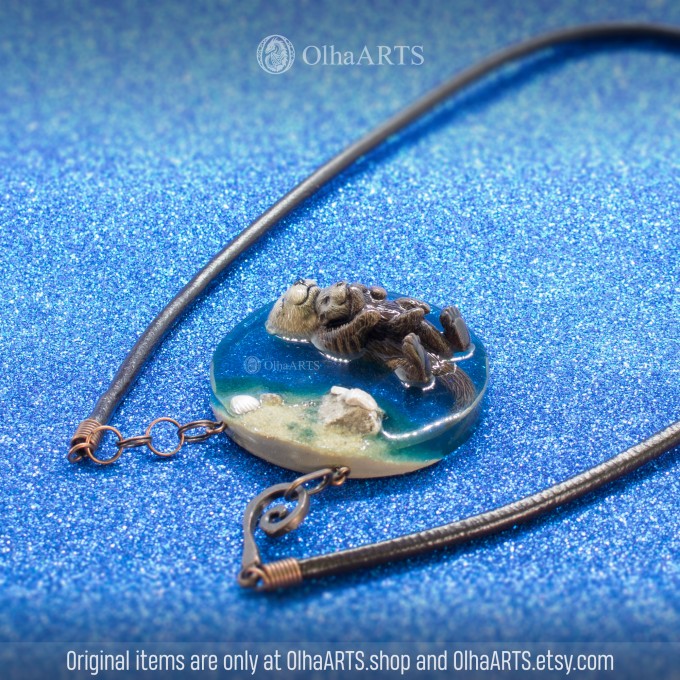 Pendant with Swimming Otters