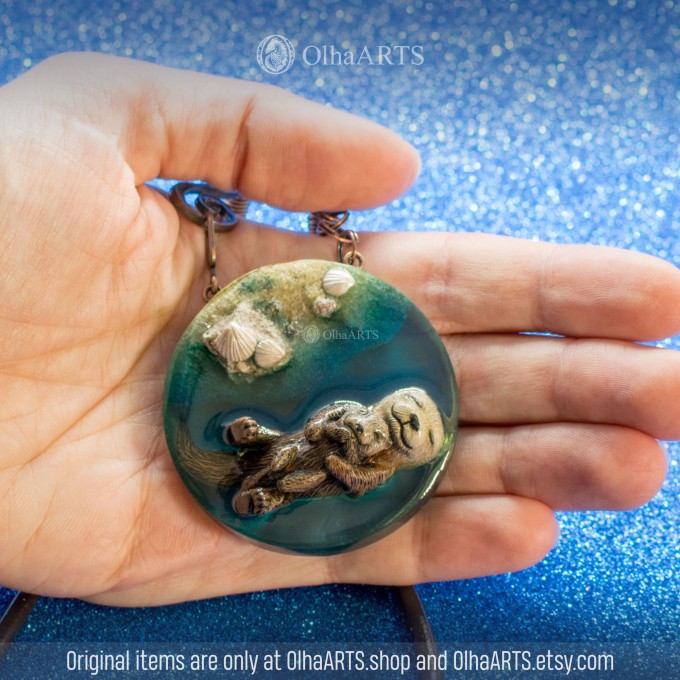 Pendant with Swimming Otters