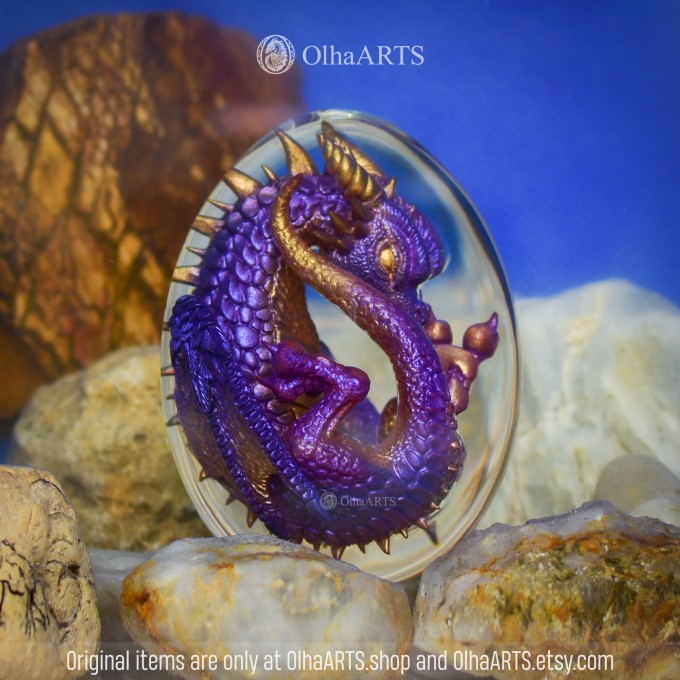 Purple-gold Spiral-horned Dragon Egg. VIP Gift Set with a spiral-horned baby dragon in epoxy resin egg