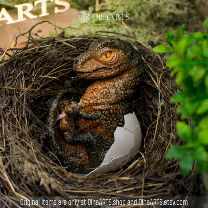 Tyrannosaurus Rex baby with its stone nest