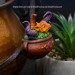 Fridge Magnet with a Miniature Dragon in a Witch Cauldron