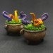 Mini figurine with a little dragon in a witch's cauldron