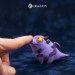 Figurine of Dracow, the cute purple dragon