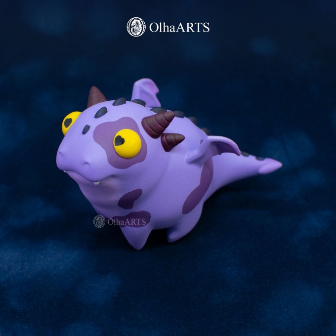 Figurine of Dracow, the cute purple dragon