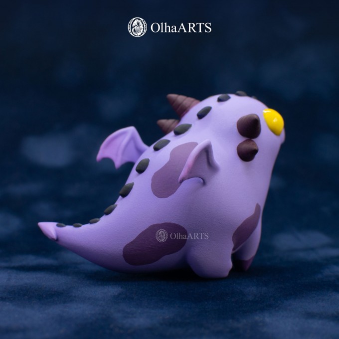 Figurine of Dracow, the cute purple dragon