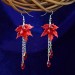 Long, Elegant Maple Leaf Earrings with Red Berries