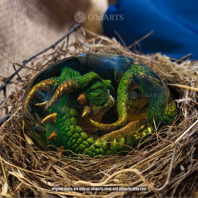 Green-gold Spiral-horned Dragon Egg. VIP Gift Set with a spiral-horned baby dragon in epoxy resin egg