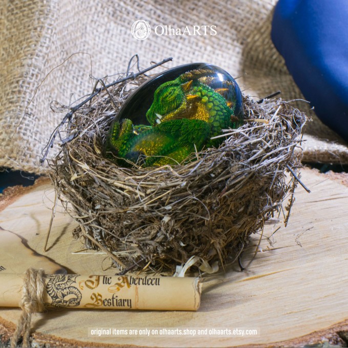 Green-gold Spiral-horned Dragon Egg. VIP Gift Set with a spiral-horned baby dragon in epoxy resin egg