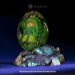 Green-gold Spiral-horned Dragon Egg. VIP Gift Set with a spiral-horned baby dragon in epoxy resin egg